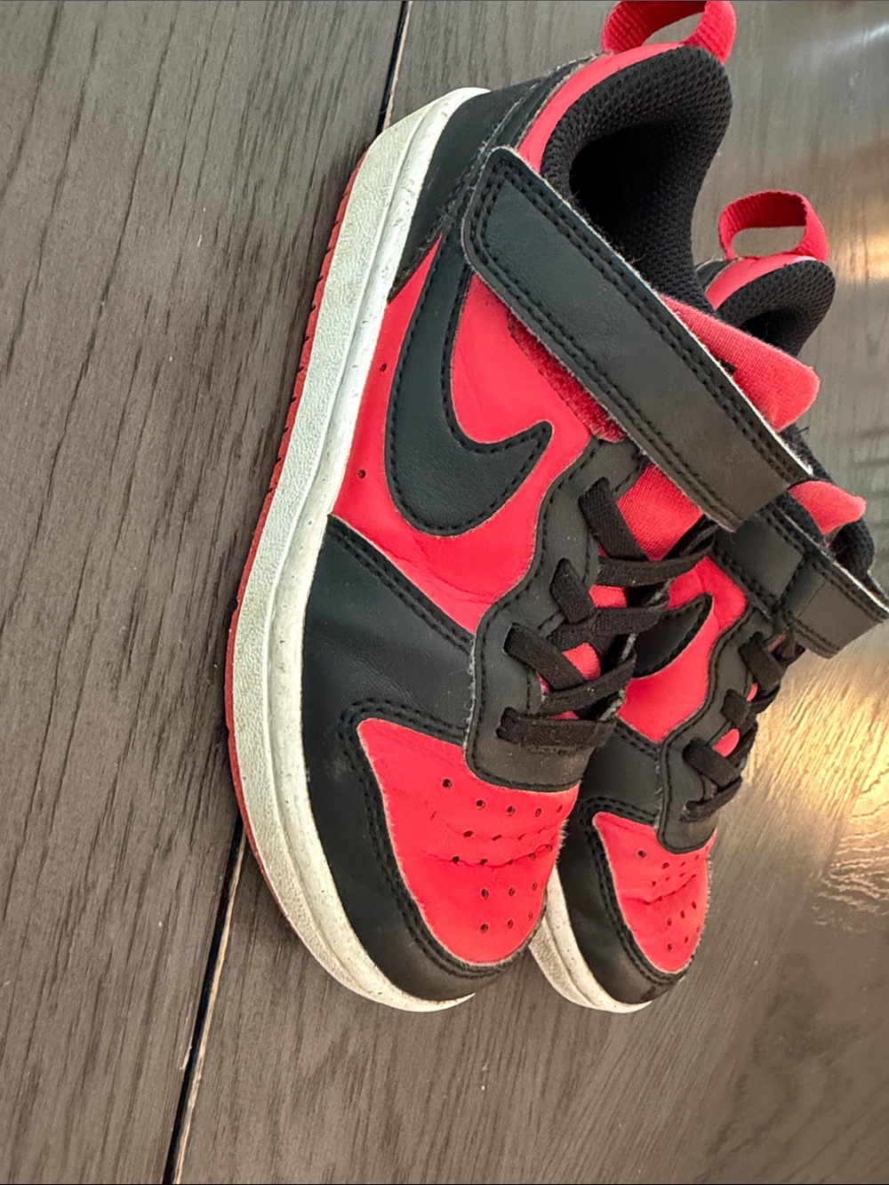 Kids Red and Black Nike Sneakers
